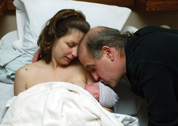 Wendy and Fred Clarke share a moment with their newborn son Aiden in the labor and delivery unit of VUMC. 
photo by John Russell