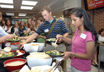 VUSN students, including Josh Sloan and Priya Champaneria, line up for lunch in the newly remodeled Annex building. (photo by Neil Brake)