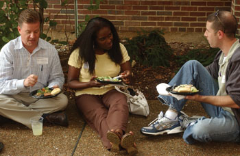 From left,  VUSN students Windle Morgan, Marlo Kemp and David Workman, chat at Monday’s picnic. 
Photo by Susan Urmy