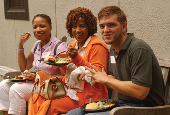 From left, Tameria Yarbrough, Zina Clark-Ousley and Jason Tallman share lunch during the School of Nursing picnic.
photo by Dana Johnson