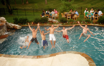 Members of the Class of 2012 take the plunge during a welcoming party last week. (photo by Anne Rayner)