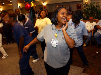 Demikia Sawyers of Environmental Services parties on the dance floor with some of her co-workers during last year’s Night Owl Howl. This year’s Howl is set for 11 p.m., Tuesday, Sept. 19.
Photo by Dana Johnson