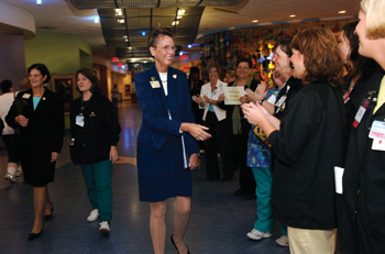 Pat Quigley of the Magnet Recognition team is greeted by faculty and staff at Children’s Hospital on Wednesday.
Photo by Dana Johnson