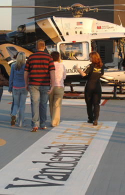 LifeFlight nurse Amy  Moore, R.N. conducts a tour for employees on the helipad atop Vanderbilt University Hospital. (photo by Neil Brake)