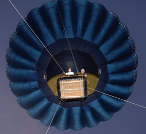 Employees Sarah Schendorf and Austin Henderson with Marketing Outreach got a quick ride in the Vanderbilt Sports Medicine hot air balloon early Tuesday morning as part of the Employee Celebration Month activities. (photo by Neil Brake)