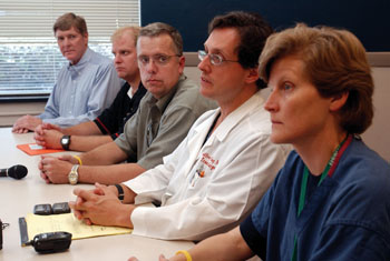 From left to right, Bobby Frist, M.D., Leland Lancaster, M.D., Stephen Guillot Jr., Jeff Guy, M.D., and Robin Hemphill, M.D., talk to the local media about receiving hurricane victims as patients at Vanderbilt and other area hospitals. 
photo by Dana Johnson