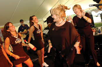 Deb Kemp and Carol Byrd of Soul Incision perform with the help of some Vanderbilt University cheerleaders at Tuesday’s Employee Celebration Month kickoff festivities.
photo by Dana Johnson