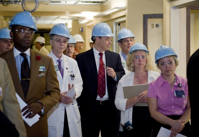 Jeff Balser, M.D., Ph.D., center, and members of the Clinical Enterprise Group get an update on the tower during a recent tour. (photo by Joe Howell)